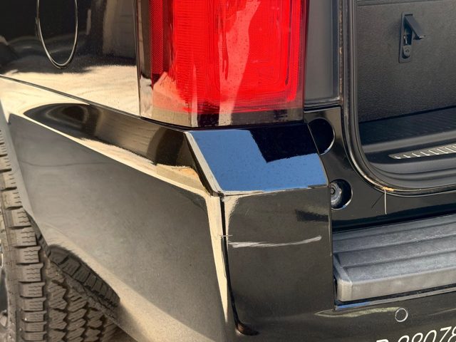 Rear bumper corner scuff